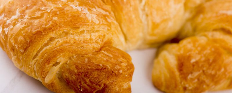 Tasty Pastry Tasty Treats: Close-up on flaky croissant