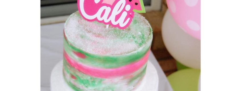 Tasty Pastry Custom Cakes: Two-tier birthday cake with white icing & dark pink/green decor