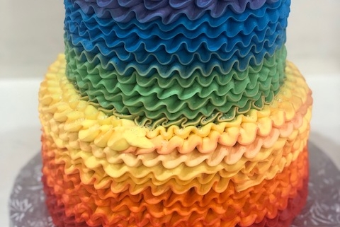 Two-tiered Rainbow Ruffle Cake