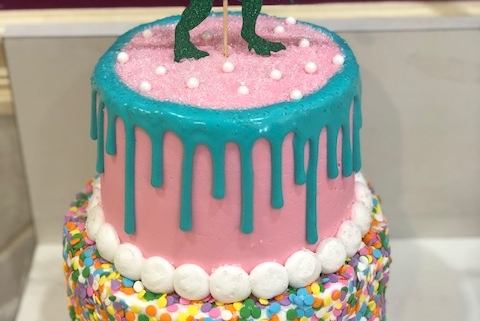 Two-tiered Sprinkles and Drip Dinosaur Birthday Cake