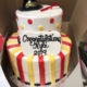 Two-tiered Stripe and Polka Dot Graduation Cake